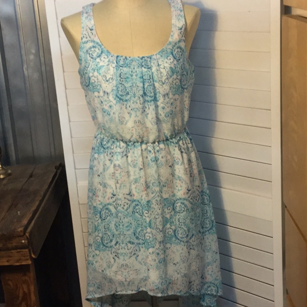 Lily Rose sleeveless dress with back lace detail.